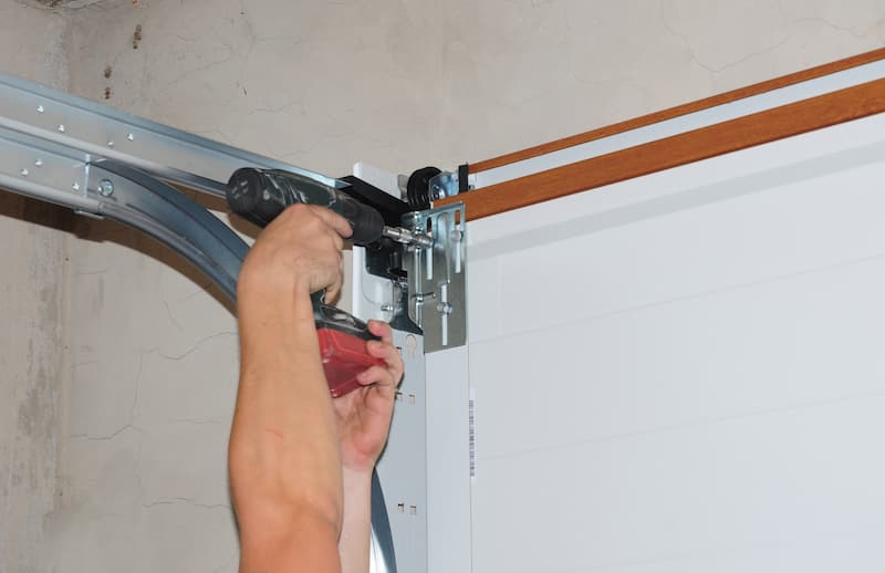 Garage door rollers and pulleys being replaced
